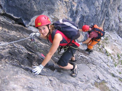 Climber on the Harrat cliff edge