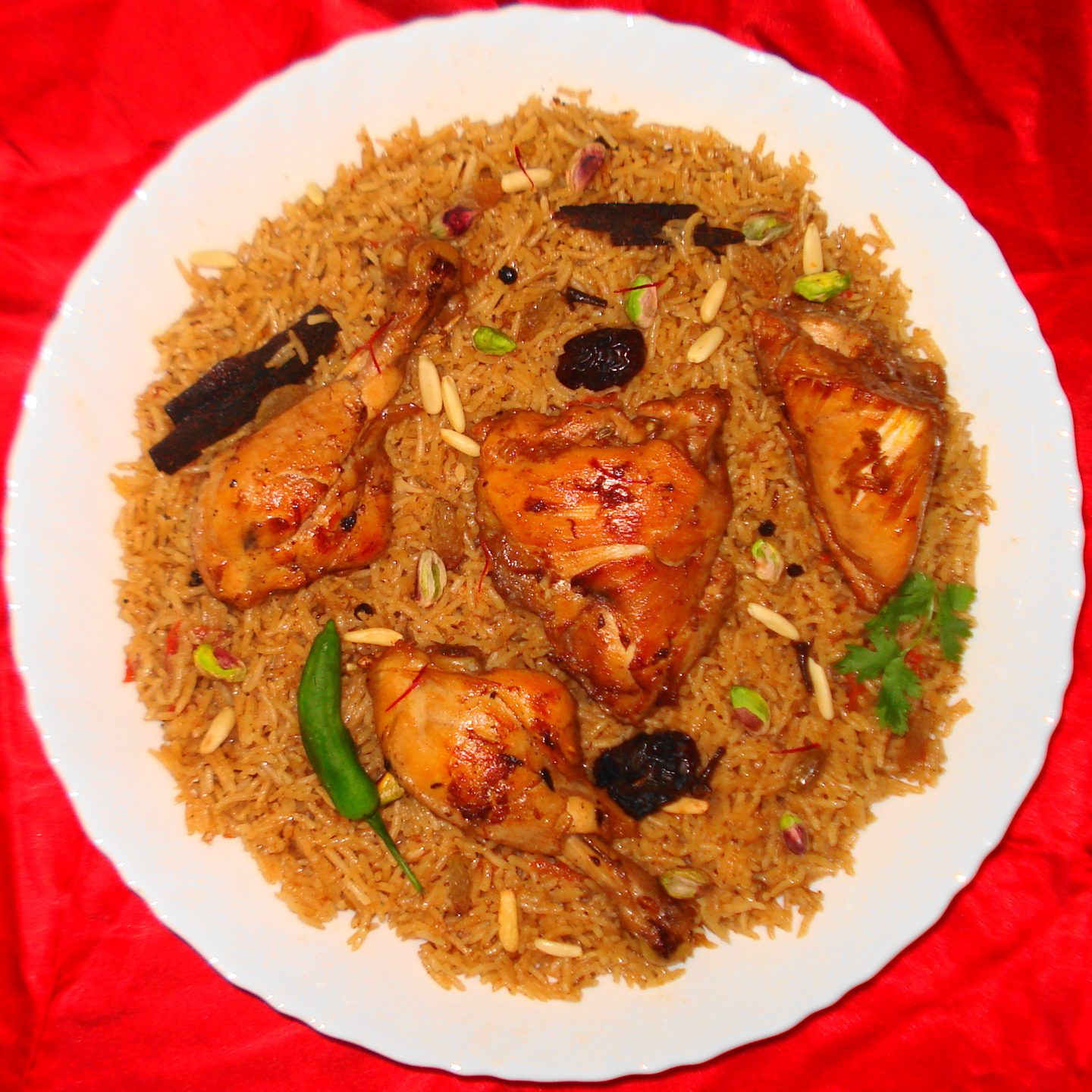 Kabsa served on a brass platter